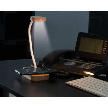 Logo trade meened foto: Juhtmeta laadijaga laualampTomsk