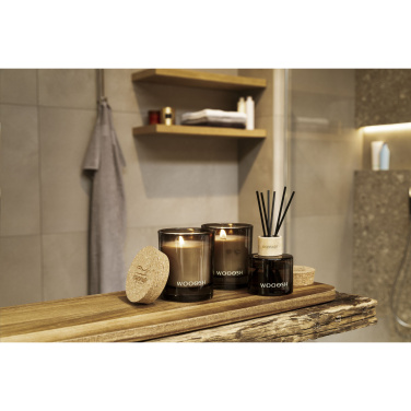 Logotrade ärikingituse foto: Woooshi lõhnaküünal korgist kaanega